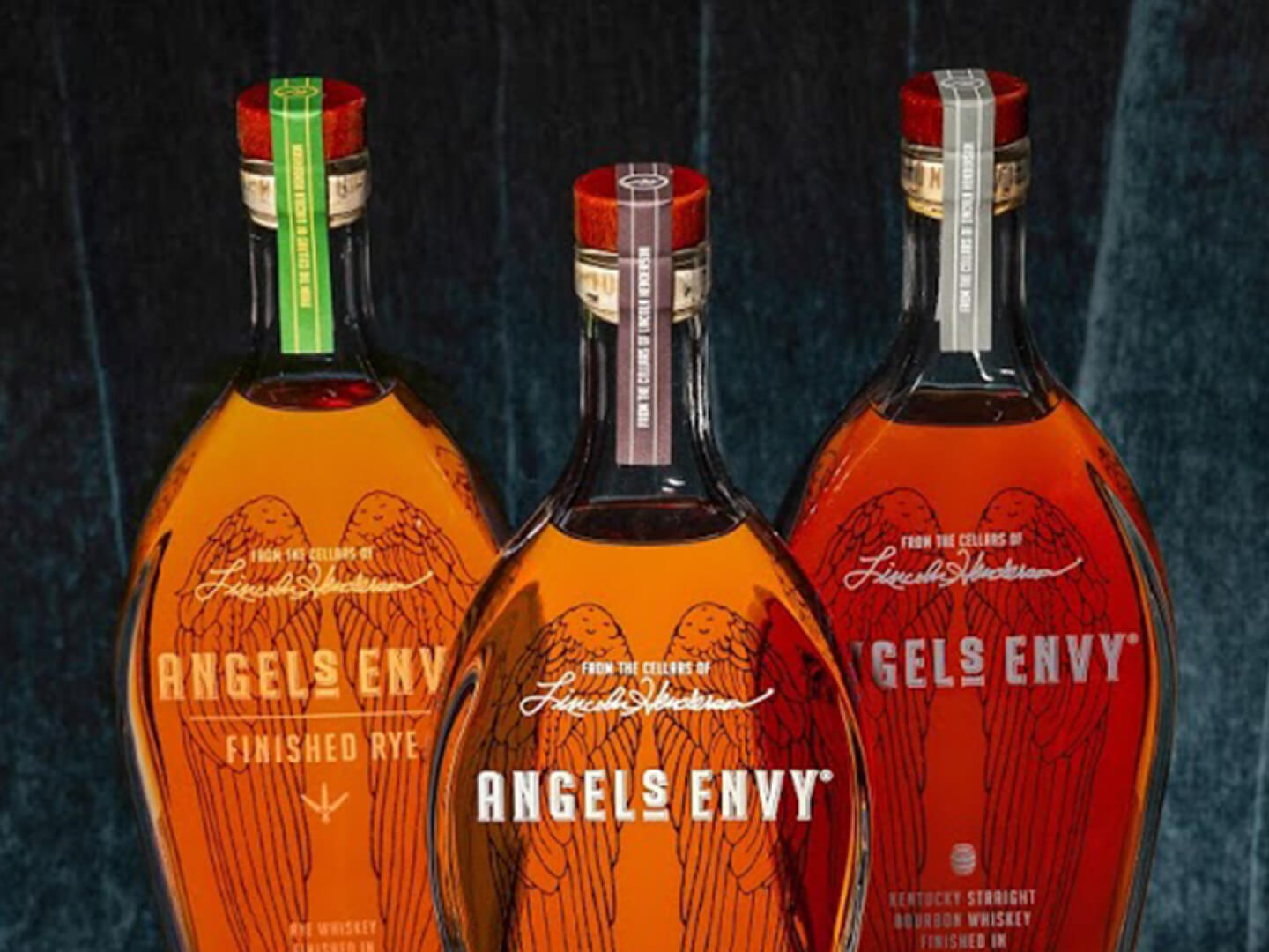FY22_US_AngelsEnvy_AllProducts_ThreeBottlesStraightOn_Desktop (1)