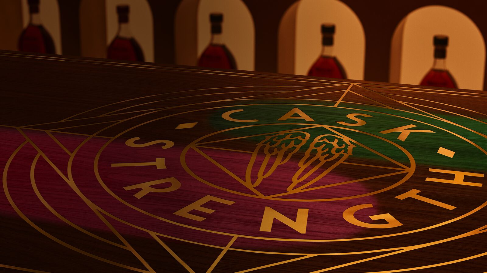 A teaser of the Angel’s Envy Spring 2026 Dual Cask Strength release within the Cask Archive room, featuring green and ruby spotlight casting across a logo-engraved tabletop.