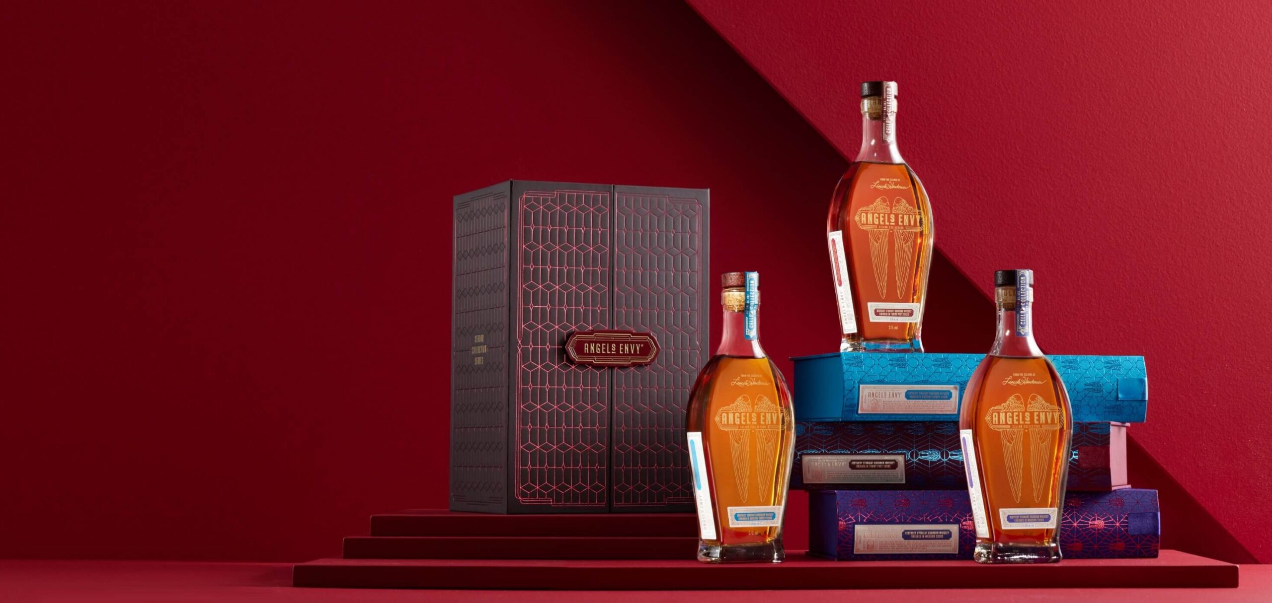 The Trilogy Collection featuring Cellar Collection Volumes 1–3 on top of their book-inspired presentation boxes with the outer concealing package to the side.