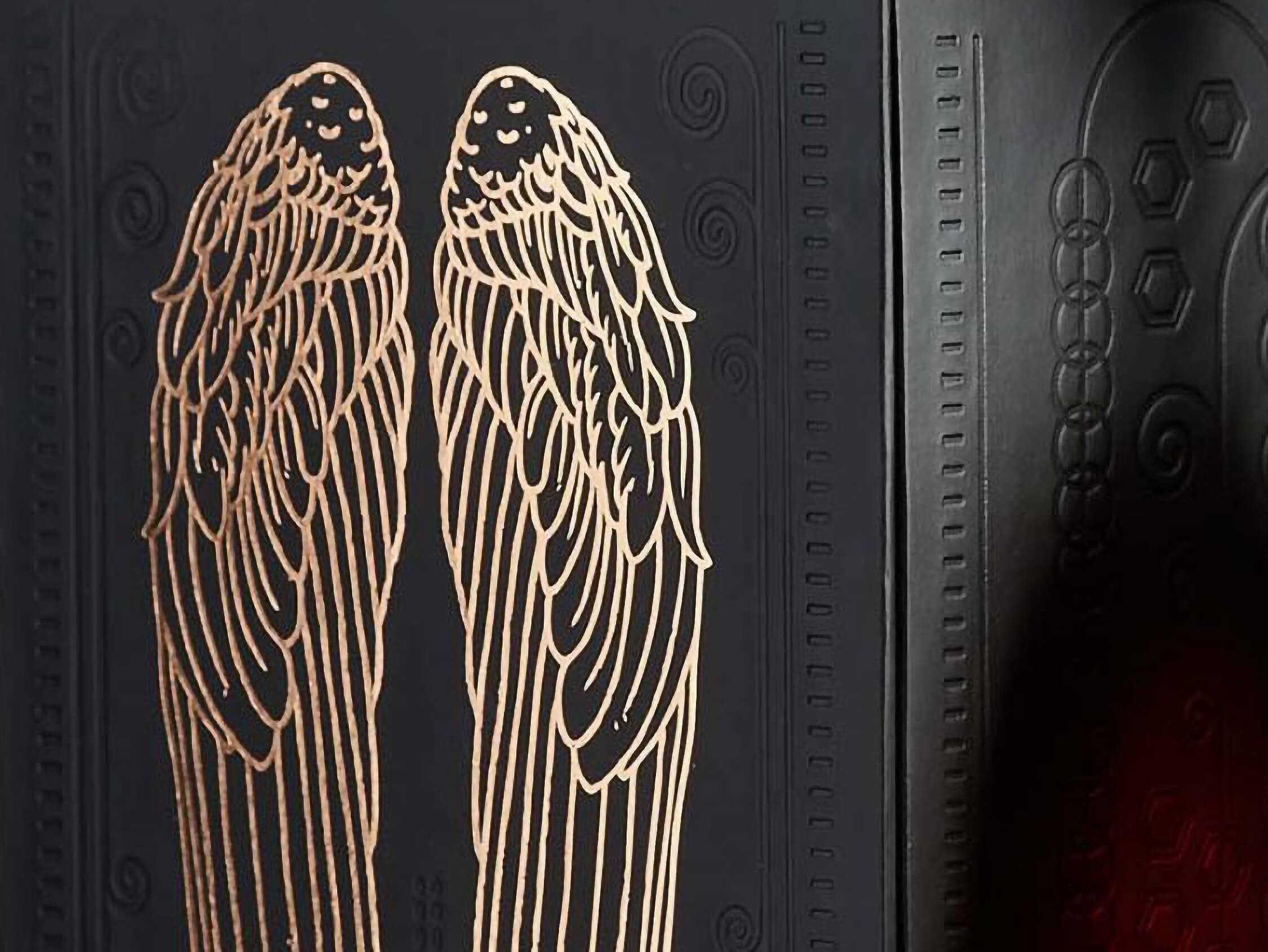 The bold Angel’s Envy Mizunara Finished Bourbon presentation box featuring a patent golden wings logo.