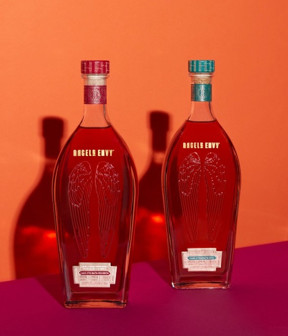 Two limited-edition bottles of Angel’s Envy Cask Strength Bourbon and Angel’s Envy Cask Strength Rye Whiskey. Both bottles feature a label dating the release in 2023.
